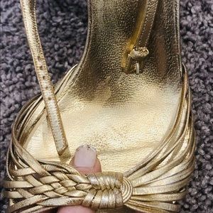 Gold Gucci stilettos